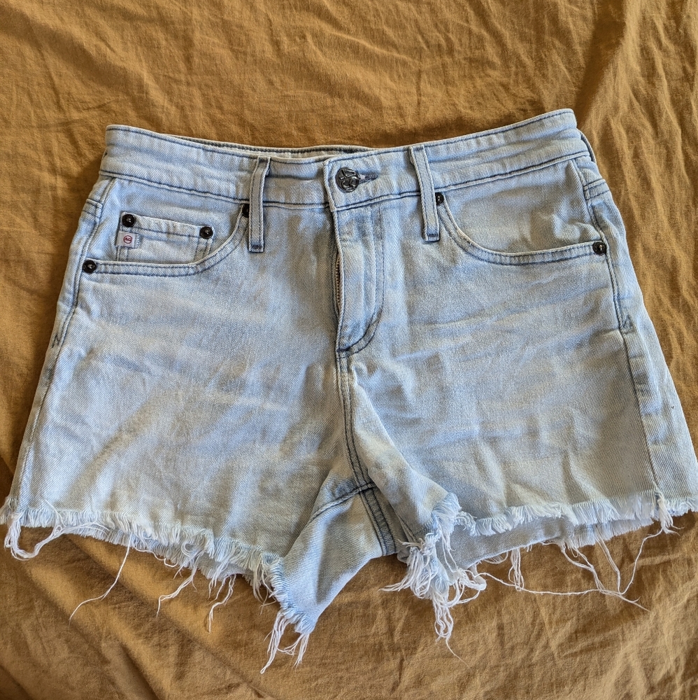 AG-ed Light Blue Denim Frayed Hem Shorts